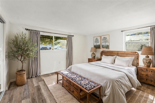 bedroom with hardwood / wood-style flooring