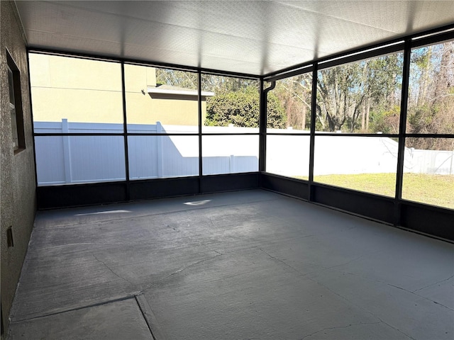 unfurnished sunroom with a healthy amount of sunlight