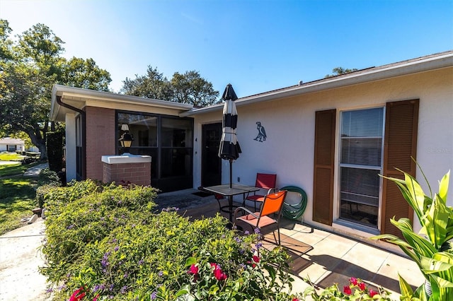 back of house featuring a patio area