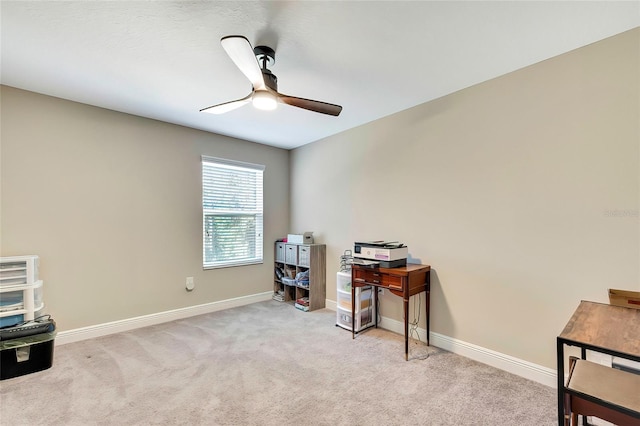 misc room with light carpet and ceiling fan