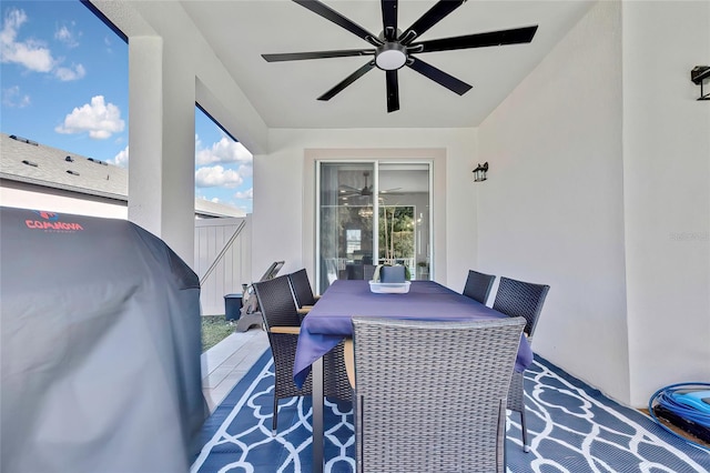 view of patio featuring ceiling fan