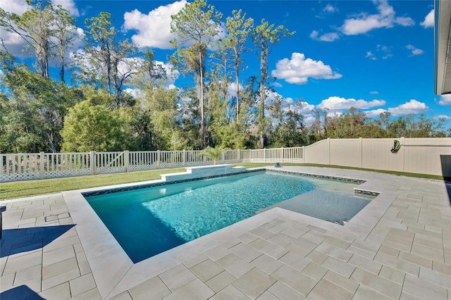 view of pool featuring a patio