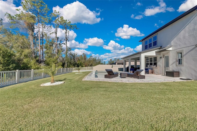 view of yard with outdoor lounge area and a patio