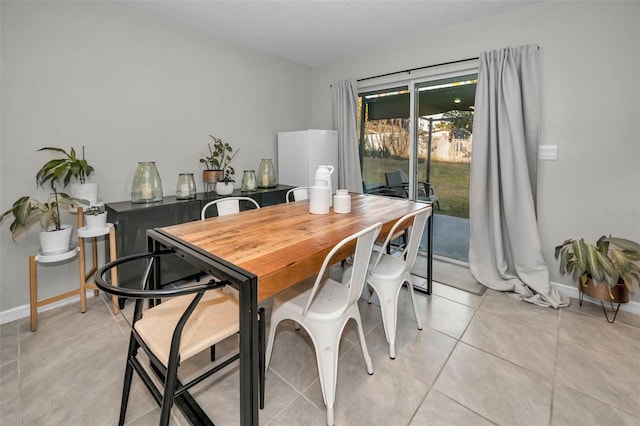 view of tiled dining space