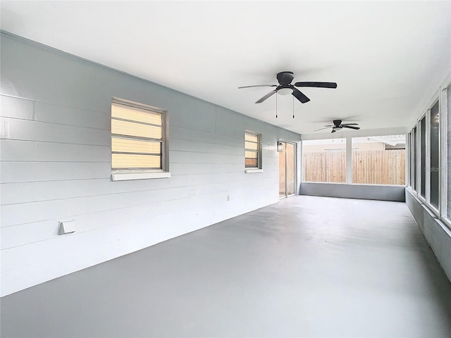 interior space featuring ceiling fan