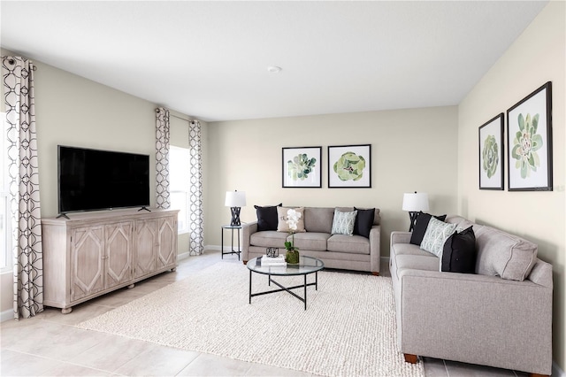 living room featuring light tile patterned floors