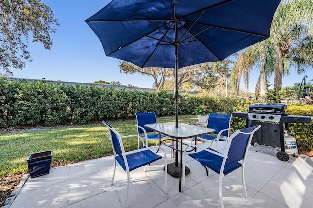 view of patio with a grill