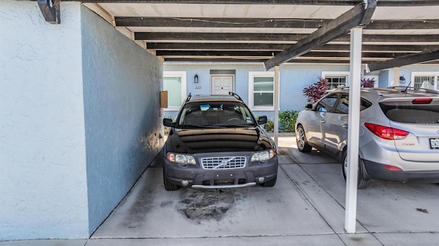 view of car parking featuring a carport