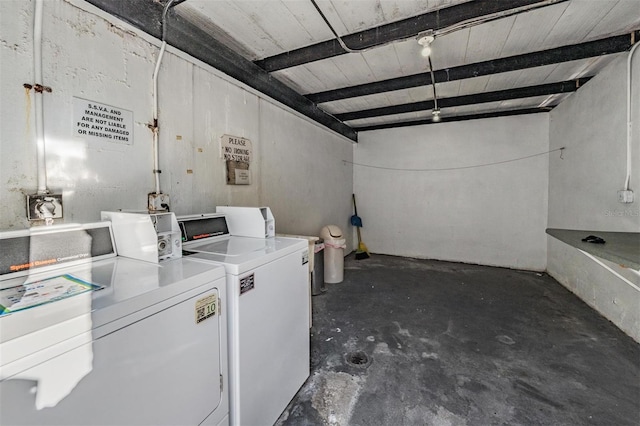 laundry room featuring washing machine and dryer