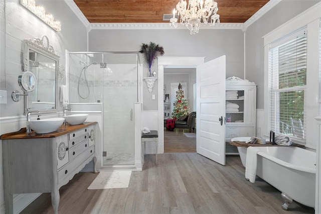 bathroom with wood-type flooring, separate shower and tub, wooden ceiling, and crown molding