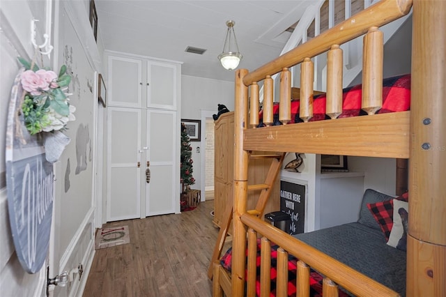 bedroom featuring hardwood / wood-style floors