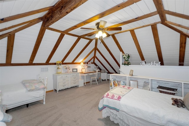 carpeted bedroom featuring lofted ceiling with beams and ceiling fan