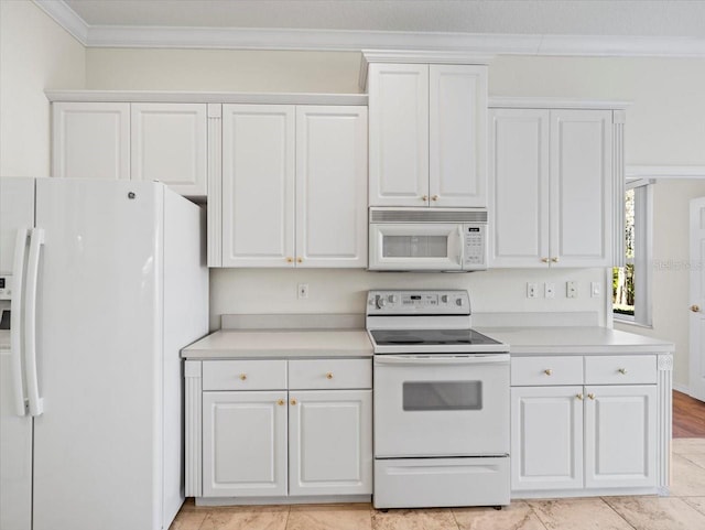 kitchen with white cabinets, white appliances, and ornamental molding