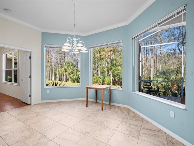 unfurnished dining area with a notable chandelier, crown molding, and a wealth of natural light