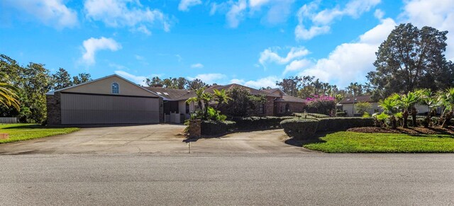 ranch-style house featuring a garage