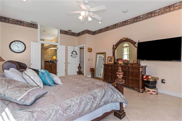 tiled bedroom with ceiling fan