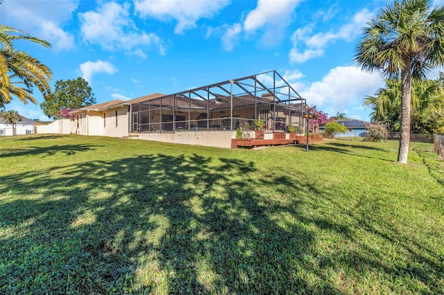 view of yard with a lanai