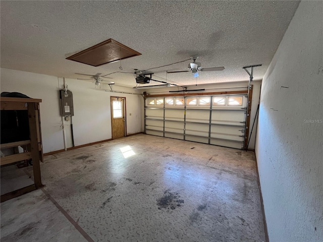 garage with electric panel, a garage door opener, and ceiling fan