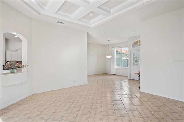 tiled spare room with beam ceiling and coffered ceiling