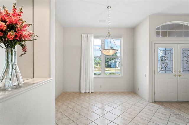 entrance foyer featuring light tile patterned flooring