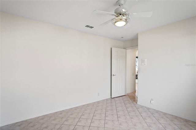 spare room with ceiling fan