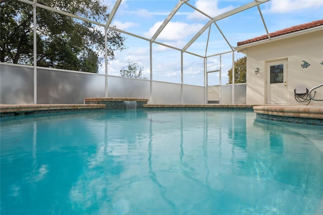 view of pool featuring a lanai