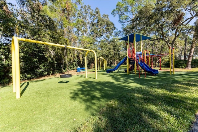 view of playground featuring a lawn