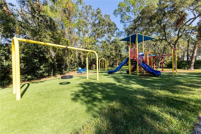 5211 Karlsburg Pl, Palm Harbor, FL 34685 - community play area featuring a yard