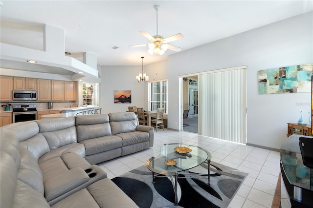 5211 Karlsburg Pl, Palm Harbor, FL 34685 - living room with light tile patterned flooring, a chandelier, and a ceiling fan