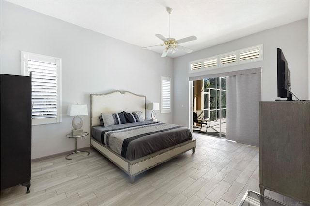 5211 Karlsburg Pl, Palm Harbor, FL 34685 - bedroom with access to outside, light wood-style floors, and ceiling fan