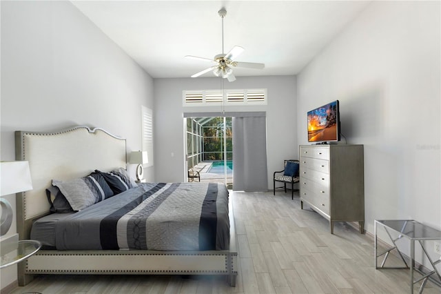 bedroom featuring access to exterior, ceiling fan, and light hardwood / wood-style flooring