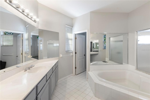 5211 Karlsburg Pl, Palm Harbor, FL 34685 - full bathroom with a bath, tile patterned flooring, vanity, and a shower