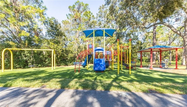 5211 Karlsburg Pl, Palm Harbor, FL 34685 - community jungle gym featuring a yard