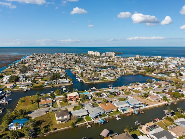 13610 Evelane Dr, Hudson, FL 34667 - aerial overview of property's location with a large body of water and nearby suburban area