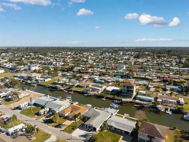 13610 Evelane Dr, Hudson, FL 34667 - aerial perspective of suburban area with a large body of water
