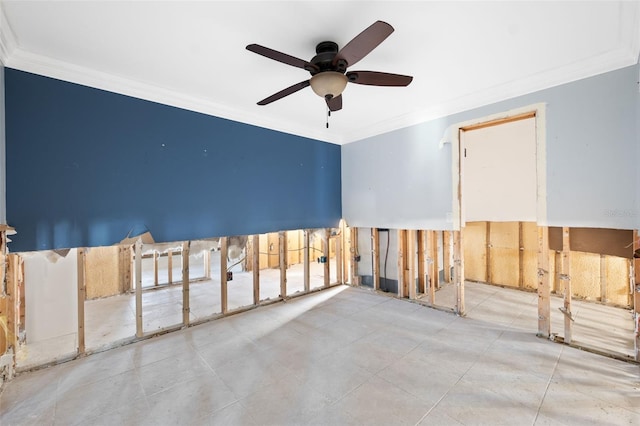 unfurnished room with ceiling fan and ornamental molding