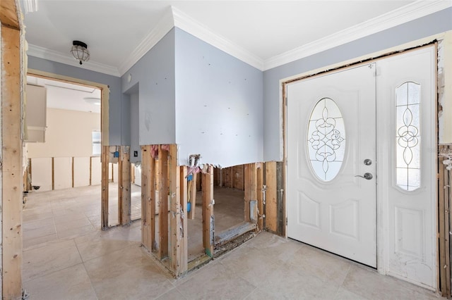 entryway featuring ornamental molding