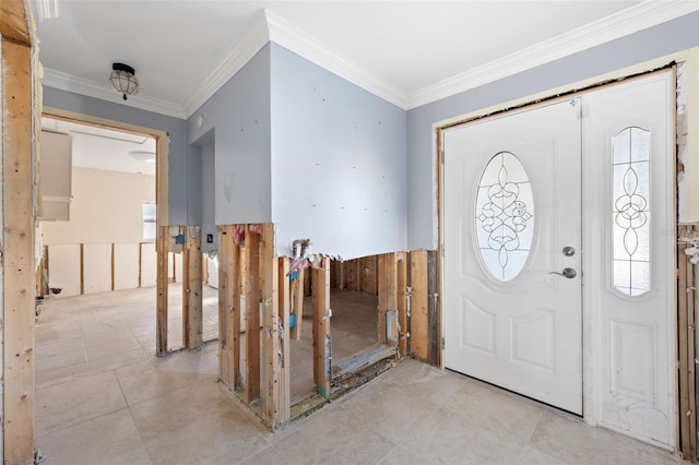 13610 Evelane Dr, Hudson, FL 34667 - foyer entrance featuring wainscoting and crown molding