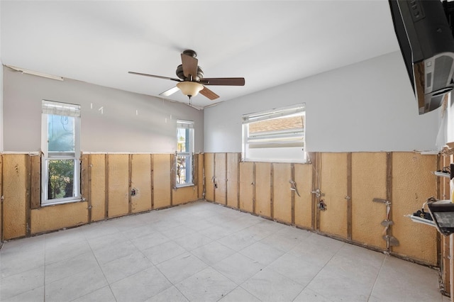 spare room with ceiling fan