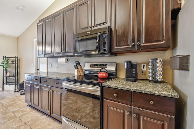 kitchen with lofted ceiling, electric range, dark brown cabinets, light tile patterned flooring, and light stone counters