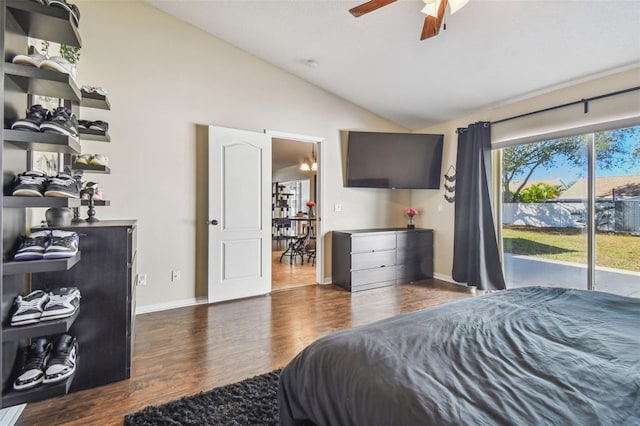 bedroom with dark hardwood / wood-style flooring, access to outside, vaulted ceiling, and ceiling fan