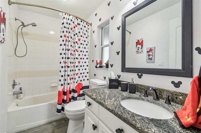 full bathroom featuring hardwood / wood-style flooring, vanity, toilet, and shower / bathtub combination with curtain