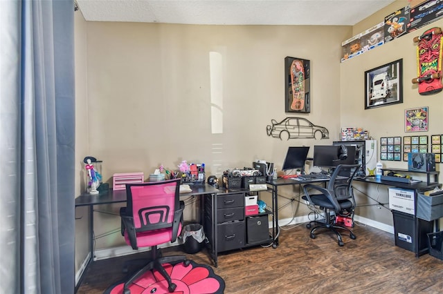 office space with dark hardwood / wood-style flooring