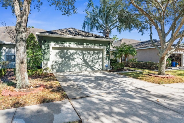 single story home with a garage