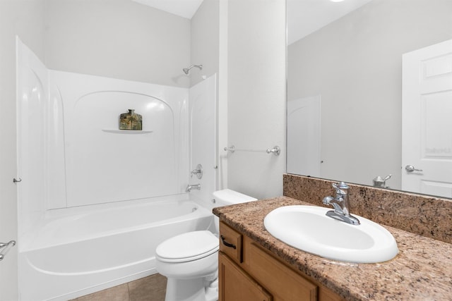 full bathroom featuring toilet, vanity,  shower combination, and tile patterned floors