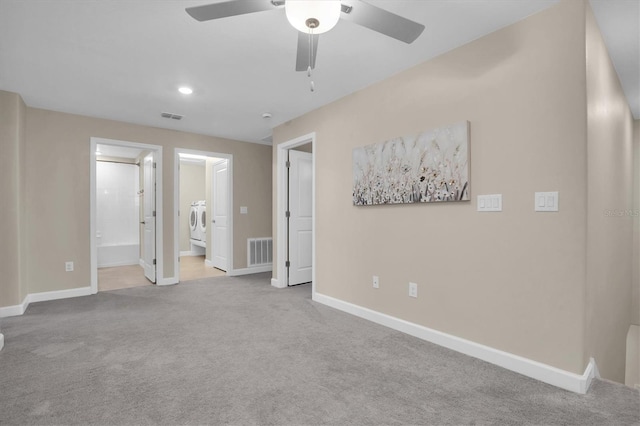 unfurnished bedroom featuring ensuite bathroom, ceiling fan, and light colored carpet