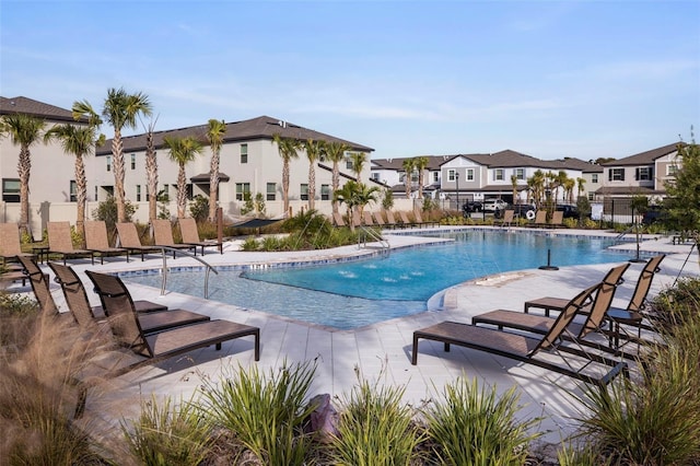 view of swimming pool with a patio