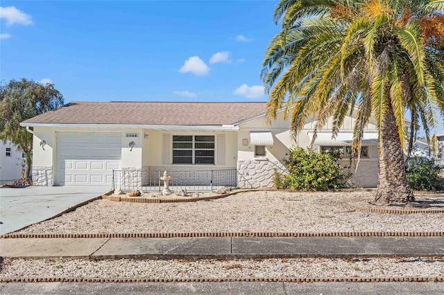 single story home with a garage