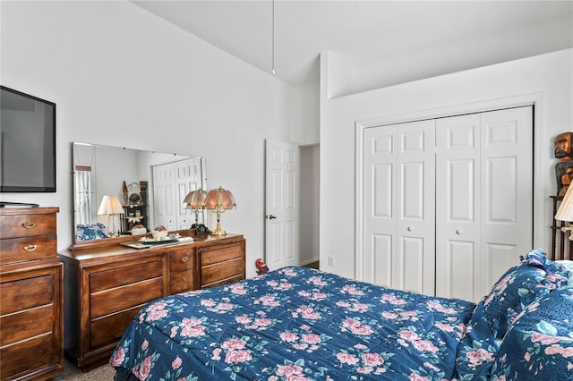 carpeted bedroom with a closet