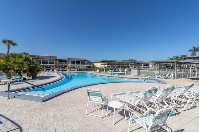 view of swimming pool featuring a patio